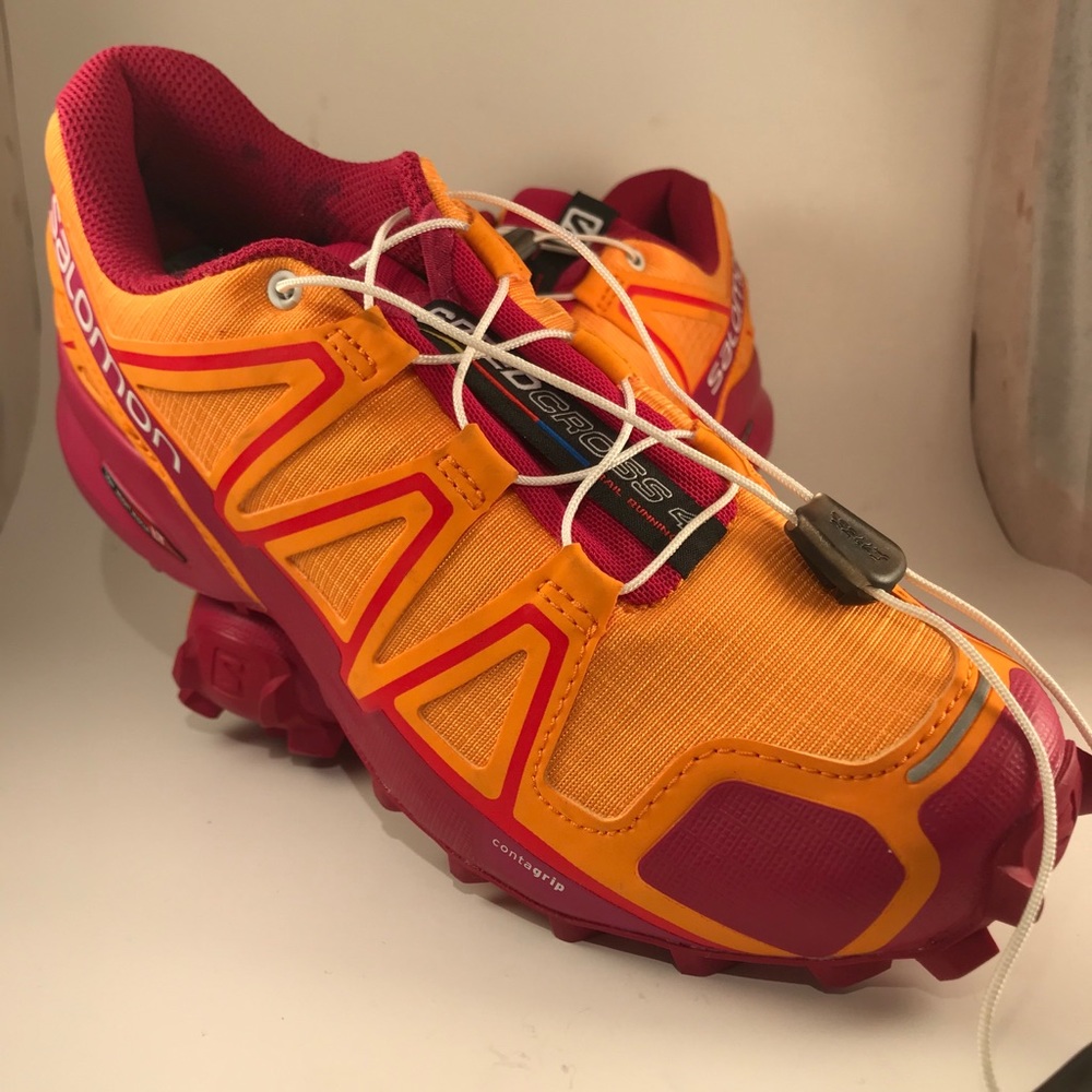 Salomon Tail Running shoes in orange and pink